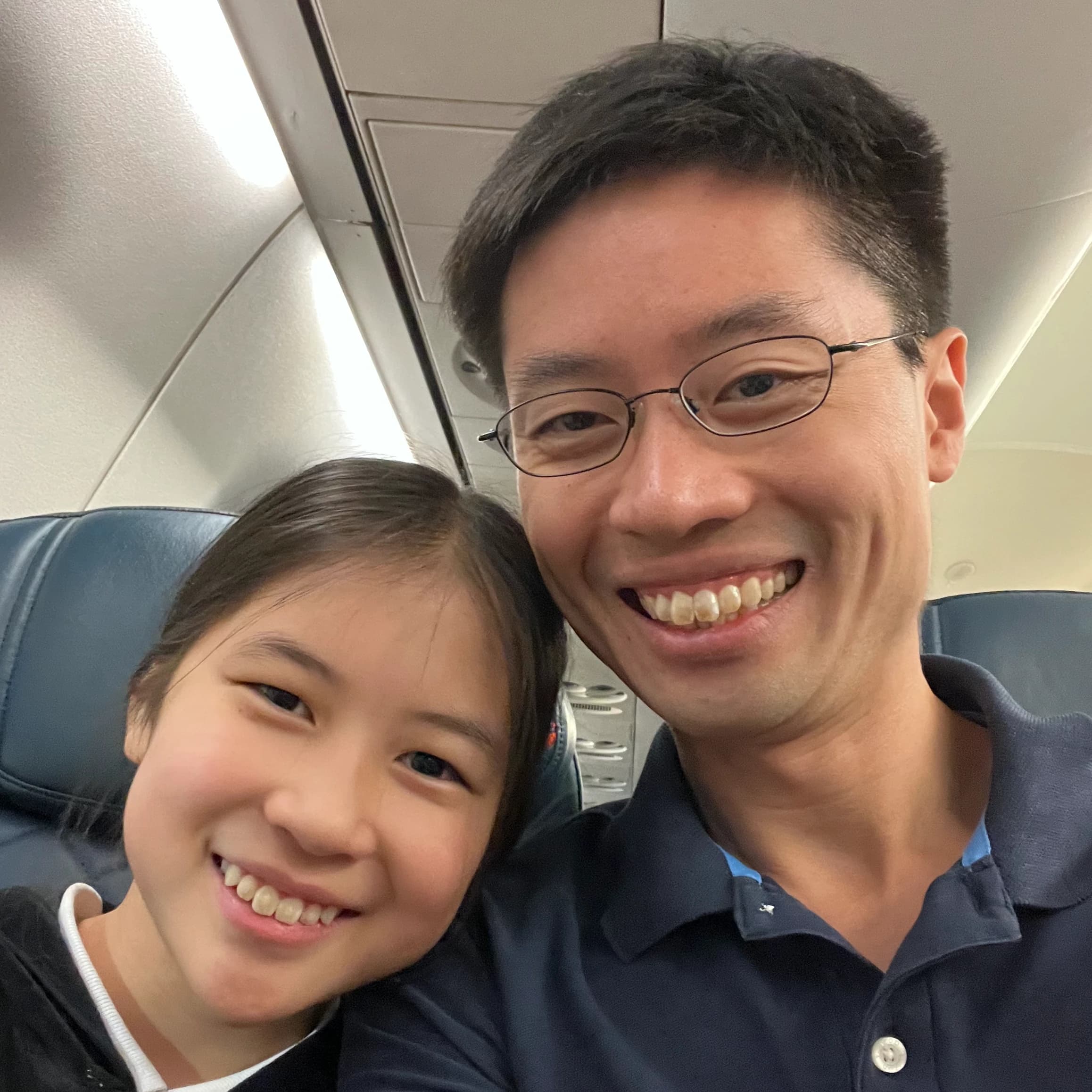 Po-Shen Loh with daughter.