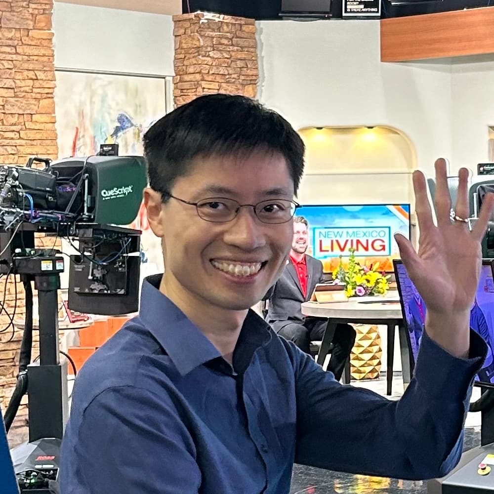 Po-Shen Loh at a TV studio.