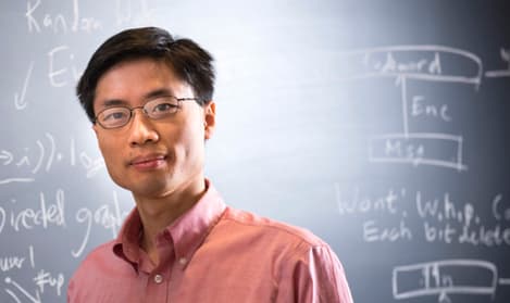 Po-Shen Loh at chalkboard